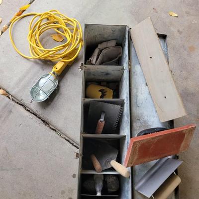 Steel box with masons tools and treble light