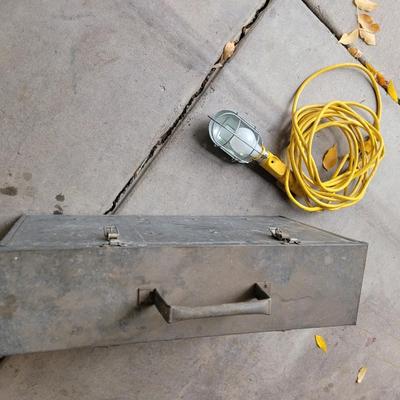 Steel box with masons tools and treble light