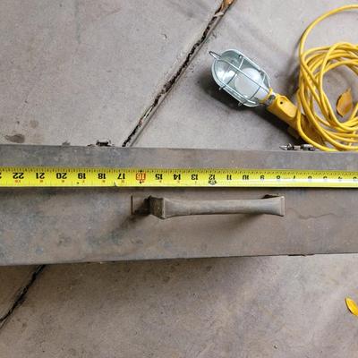 Steel box with masons tools and treble light