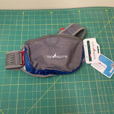 Runners pack with water bottle