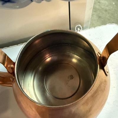 Copper teapot with porcelain handle