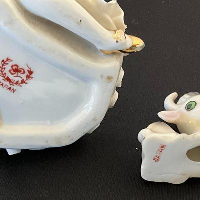 Porcelain girl with pups