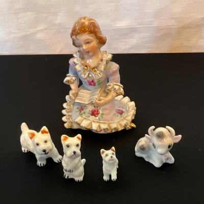 Porcelain girl with pups