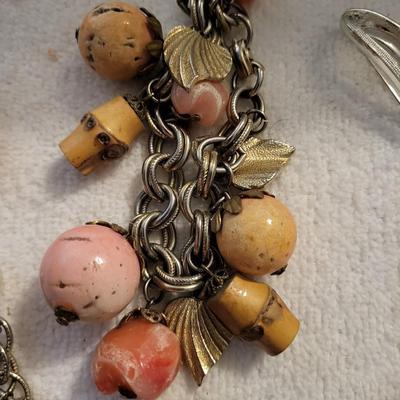A VARIETY OF COSTUME JEWELRY