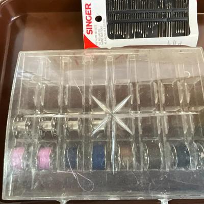Sewing thread, patterns, scissor, etc