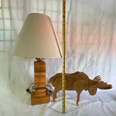 Wooden lamp with wooden moose