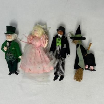 Sale Photo Thumbnail #773: Pre-auction estimate: $100-200. Includes Glinda, Wicked Witch of the West, Wizard, and Frank Morgan. Total of 4 pieces. Ornaments are dated 1985. Measurement of largest: 8.5". [BS]