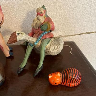 Lot 95 - House of Hatten Santa Elf on a Goose Ornament and Wooden Cats