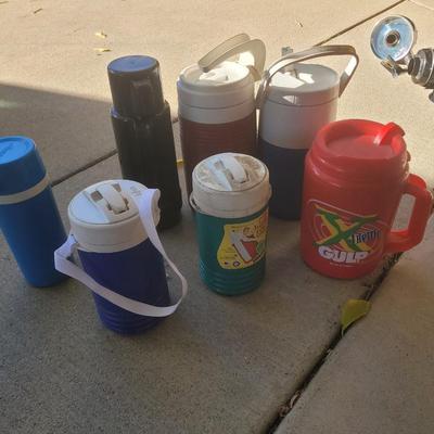Collection of jugs, thermos's and 1 xtreem gulp 52 oz