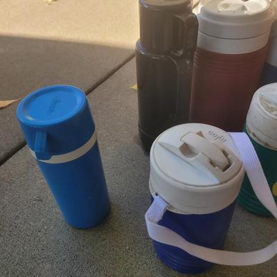 Collection of jugs, thermos's and 1 xtreem gulp 52 oz