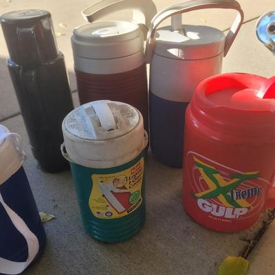 Collection of jugs, thermos's and 1 xtreem gulp 52 oz