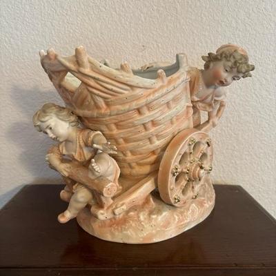 Lot 67 - Unmarked Porcelain Pink Gold Cherub Mother and Child with Cart