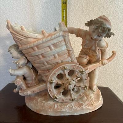Lot 67 - Unmarked Porcelain Pink Gold Cherub Mother and Child with Cart