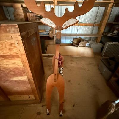 Wooden deer with bells