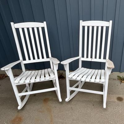 Two wood rocking chairs