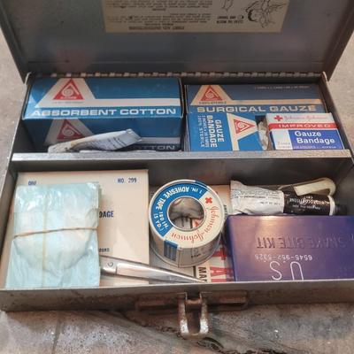 2 soldering irons and metal first aid kit
