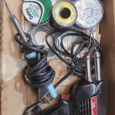 2 soldering irons and metal first aid kit