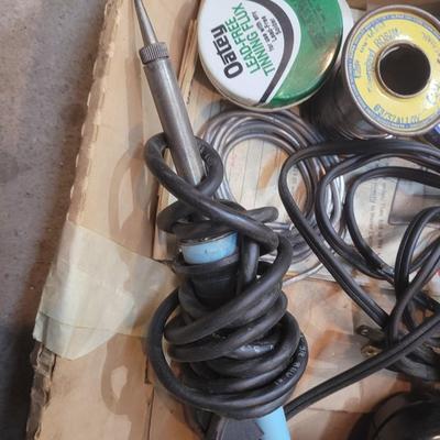 2 soldering irons and metal first aid kit