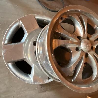 Two Custom chrome rims used on an impala plus one