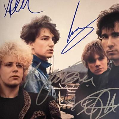 U2 band signed photo