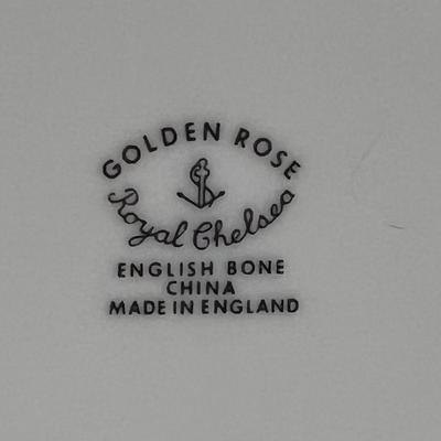 Sale Photo Thumbnail #839: "Golden Rose." Made in England. This is a service for 12, but is missing two dessert plates. Includes dinner plates, salad plates, snack plates, dessert plates, soup bowls, gravy boat, salt and pepper shakers, cream and sugar, teapot, coffee pot, cups, sa