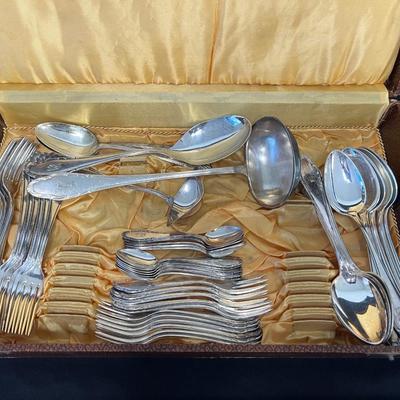 Sale Photo Thumbnail #851: Monogrammed. This is a service for 12, but is missing one dinner fork, one pastry fork, and one teaspoon. Includes dinner forks, dinner knives, soup spoons, pastry forks, teaspoons, and assorted serving pieces. Also includes two soup spoons from another m