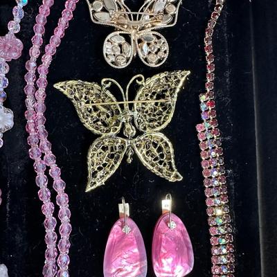 Sale Photo Thumbnail #197: Pink is the color of happiness.  This is a tray full of beautiful vintage costume jewelry ranging from 40's crystal necklaces, 50's unsigned Weiss butterfly pins, to 2000's Kendra Scott earrings.  Everything in the tray is included.  Condition is as shown