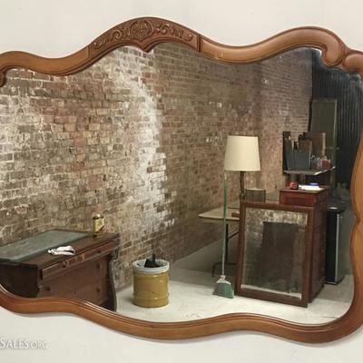 Large wood framed mirror French Provincial style 46”x33”. Lot#