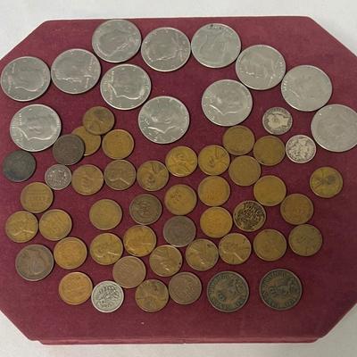 Sale Photo Thumbnail #1106: Includes 12 Kennedy half dollars (1971-1976), one Mercury dime, one Barber dime, two Indian Head pennies (1887 and 1907), assorted wheat pennies, and more. Total of 50+ coins. [LA]