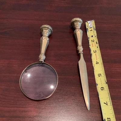 Heavy brass letter opener and magnifying glass