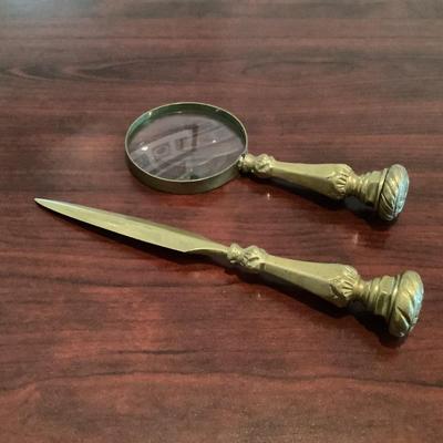 Heavy brass letter opener and magnifying glass