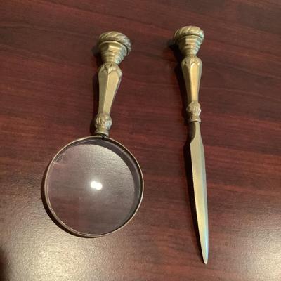 Heavy brass letter opener and magnifying glass