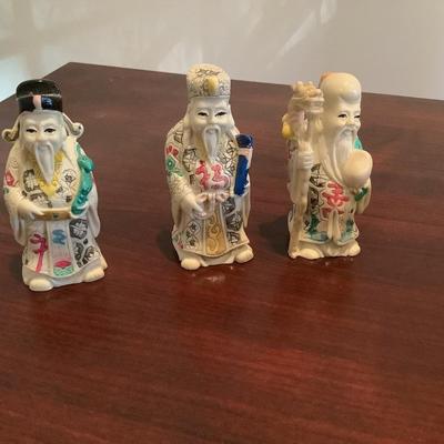 3 Asian figures representing Happy, Good Luck, and Long Life, box