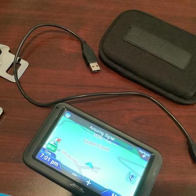 Travel lot-Magellan GPS cord & case, seat belt extenders for 2 types of airplanes, French book with CD