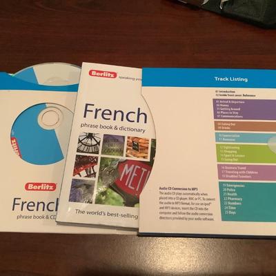 Travel lot-Magellan GPS cord & case, seat belt extenders for 2 types of airplanes, French book with CD