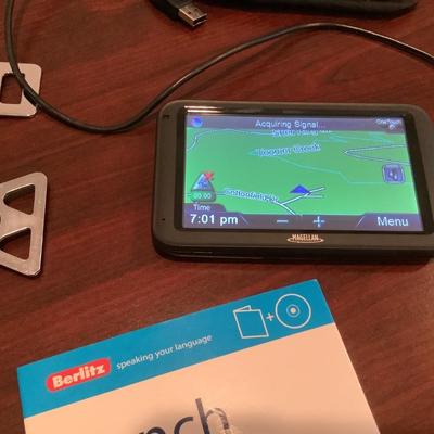 Travel lot-Magellan GPS cord & case, seat belt extenders for 2 types of airplanes, French book with CD