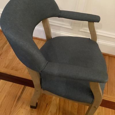 Chair with grey fabric in good condition 34"H 24"L 21"W