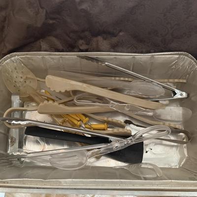 Tub of kitchen tools