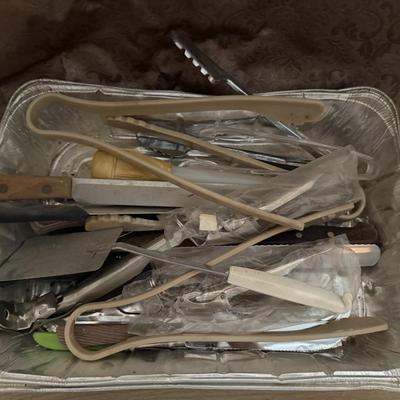 Tin of catering utensils