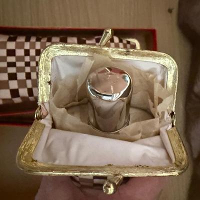 Cigarette/flask holder