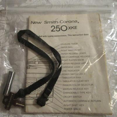 Antique Smith & Corona 250 XKE electric typewriter in locking case