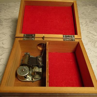 Wood Music box, plays "Raindrops Keep Falling on My Head"