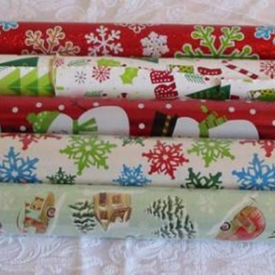 5 rolls Christmas wrapping paper, 2 new in pkg, 3 partially used
