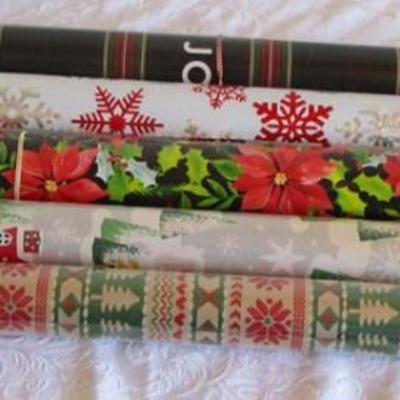 5 rolls Christmas wrapping paper, 2 new in pkg, 3 partially used