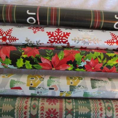 5 rolls Christmas wrapping paper, 2 new in pkg, 3 partially used