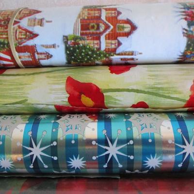 5 rolls Christmas wrapping paper, 2 new in pkg, 3 partially used
