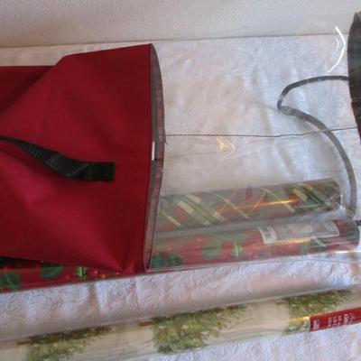 3 new rolls of Christmas wrapping paper, 1 Zippered storage bag for gift wrap