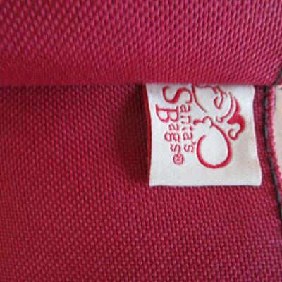 3 new rolls of Christmas wrapping paper, 1 Zippered storage bag for gift wrap