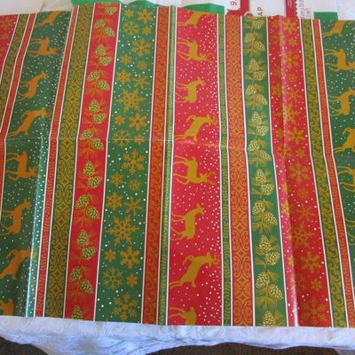 19 folded Christmas gift wrap sheets, 1 pkg Christmas tissue paper, 2 white gift boxes