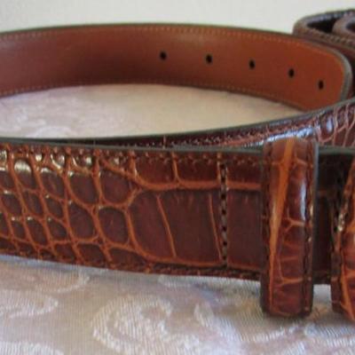 3 leather belts, one is Bill Blass alligator pattern size 42, one Leather woven belt size 42,  one brown leather belt with elk buckle...